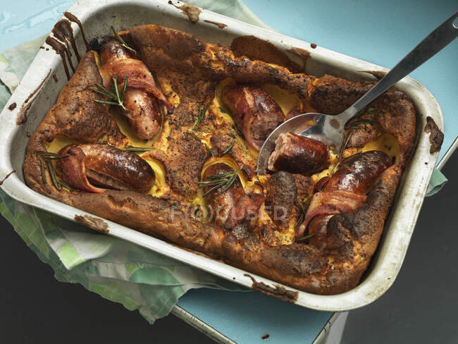 Toad In The Hole (sausages cooked in batter, England) — Stock Photo