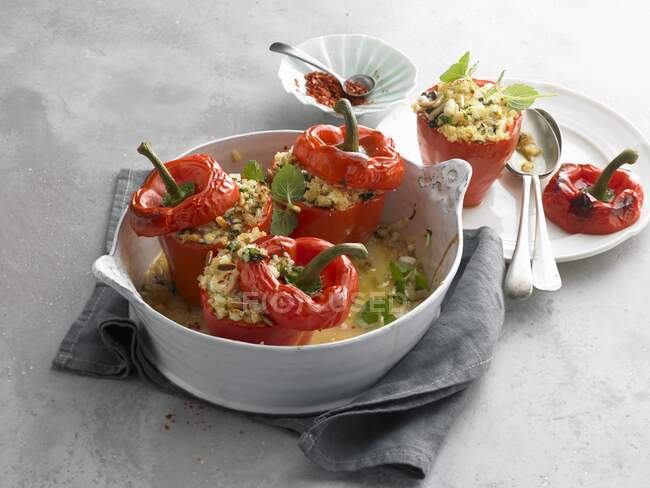 Mini peppers stuffed with couscous and pine nuts — Stock Photo