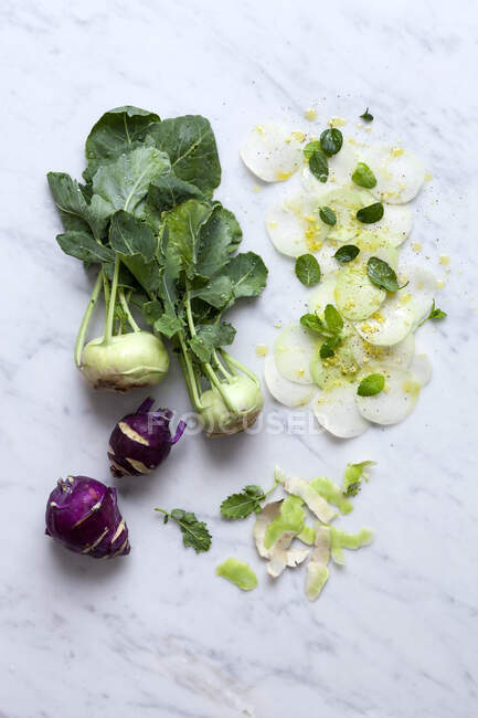 Fresh green and white radish on a wooden background. — Stock Photo