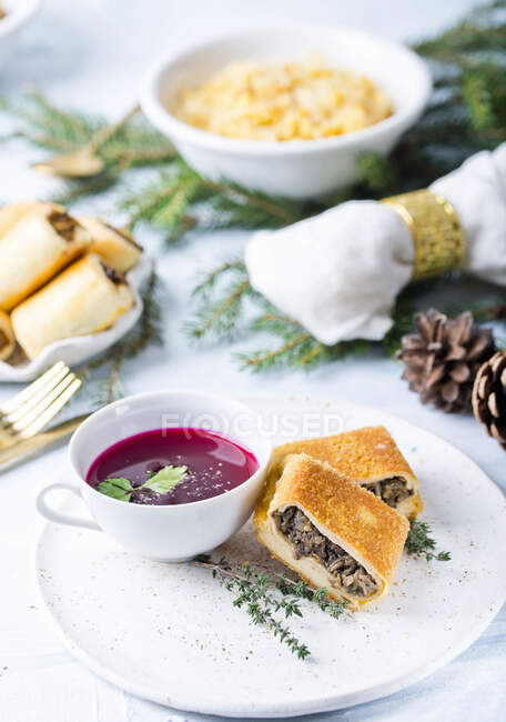 Croquettes with mushrooms with beetroot soup — Stock Photo