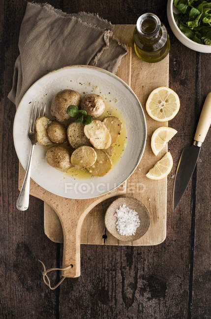Oven baked potatoes close-up view — Stock Photo