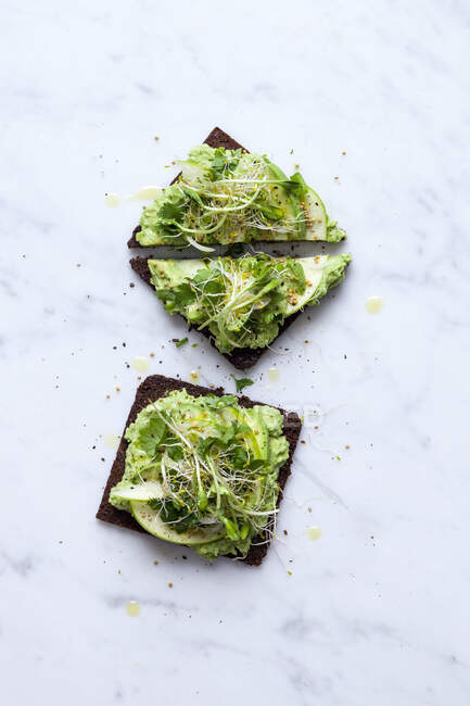 Open sandwiches with avocado — Stock Photo