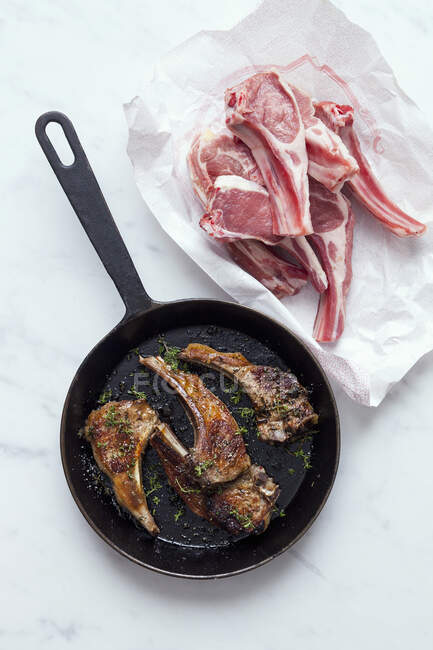 Fried lamb chops in a pan — Stock Photo