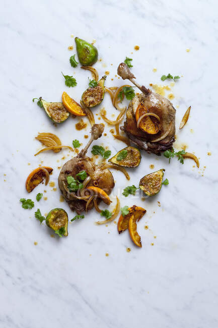 Duck confit with orange and fig — Stock Photo