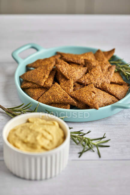 Keto tortilla chips with smoked salmon spread — Stock Photo