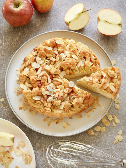 Apple cake with cashew nuts and almonds — Stock Photo