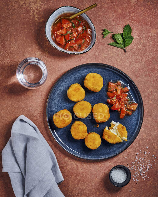 Cheese croquettes and salsa — Stock Photo