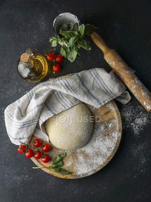 Dough for the pizza — Stock Photo