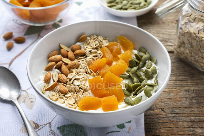 Muesli with fried apricots, almonds and pistachios — Stock Photo