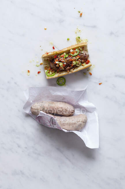 Baguette sandwich with andouillette sausage — Stock Photo