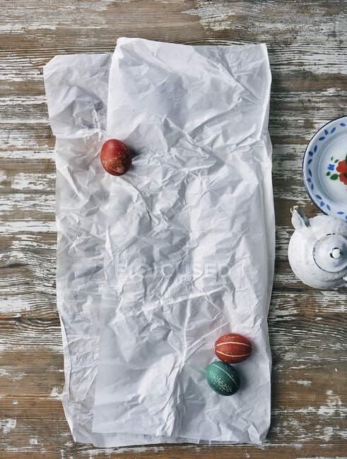 Easter eggs on tissue paper — Stock Photo