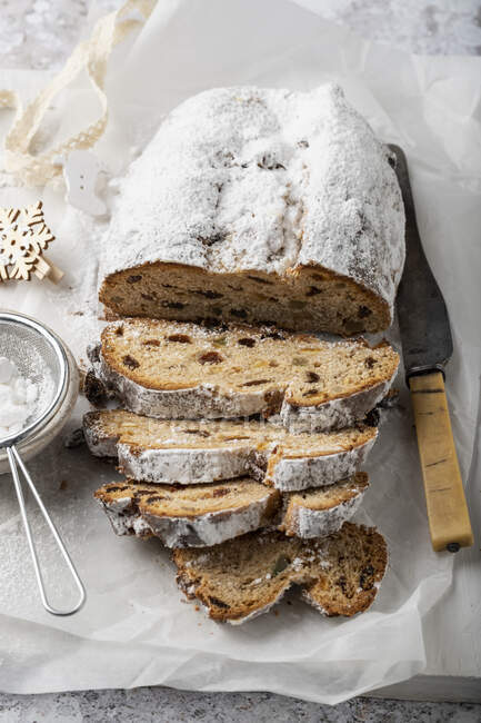 Stollen - German Christmas bread with nuts, spices and candied fruit — Stock Photo