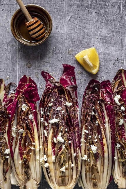 Grilled Red Chicory with Feta Cheese and Honey Lemon dressing — Stock Photo