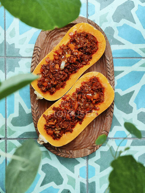 Butternut squash filled with minced meat — Stock Photo