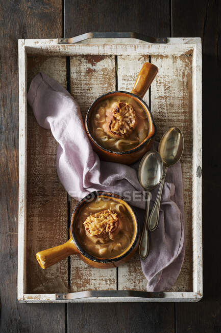 French onion soup on marble surface — Stock Photo