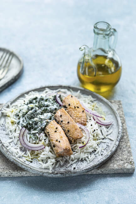 Salmon with spinach and rice — Stock Photo