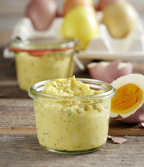 Egg spread in glass jars for Easter — Stock Photo