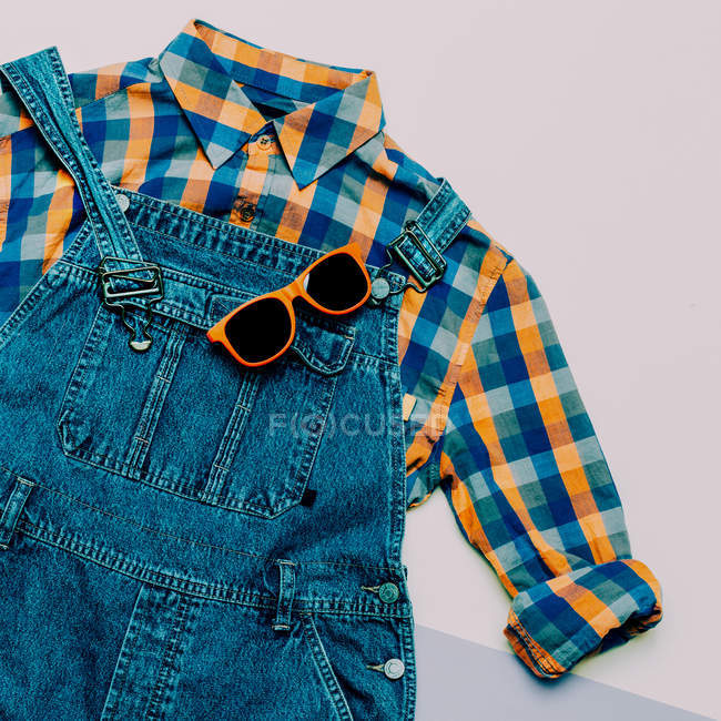 Fashionable denim overalls. Stylish clothes. Minimal Country fas — Stock Photo