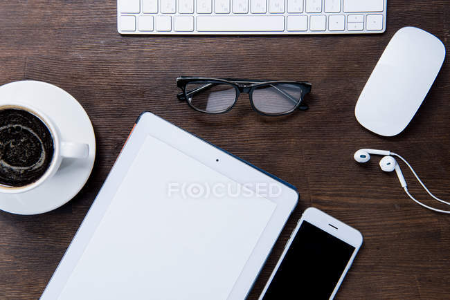 Digital tablet on desk — Stock Photo