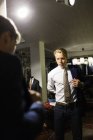 Male customer trying on suit — Stock Photo