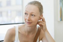 Thoughtful mid adult woman — Stock Photo