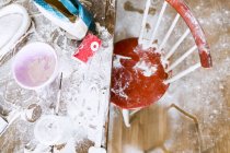 Flour on table and chair at home — Stock Photo