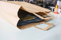 Jeans in paper bag — Stock Photo