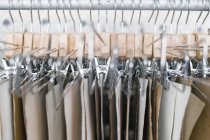 Denim fabric hanging on factory — Stock Photo