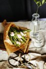 Tulip bouquet on chopping board — Stock Photo