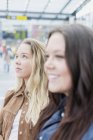 Young woman with friend — Stock Photo
