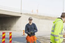 Manual workers at road — Stock Photo