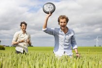 Two men with frisbee — Stock Photo