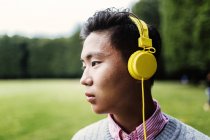Young man wearing headphones — Stock Photo