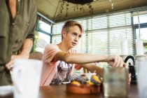 Boy and mother having breakfast — Stock Photo