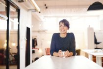 Smiling businesswoman looking away — Stock Photo