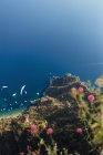 Aerial view of mountains by sea — Stock Photo