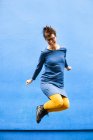 Cheerful woman jumping — Stock Photo
