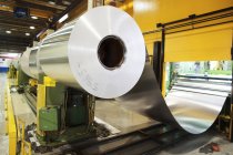 Aluminum metal rolled up in factory — Stock Photo
