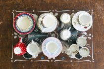 Várias xícaras de chá e pires — Fotografia de Stock