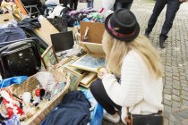 Young woman in flea market — Stock Photo