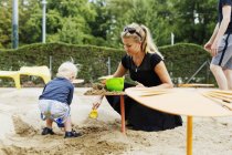 Mother and son in playground — Stock Photo