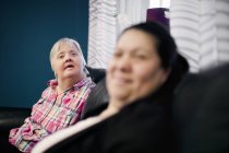 Mentally challenged woman with friend — Stock Photo