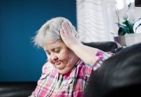 Thoughtful mentally challenged woman — Stock Photo