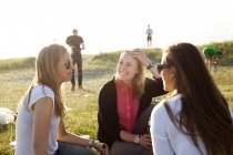 Smiling young female friends — Stock Photo
