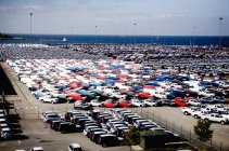 View of car parking lot by sea — Stock Photo