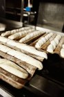 Baguette dough on baking sheets — Stock Photo