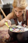 Young female artist — Stock Photo