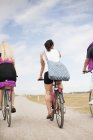 Friends riding bicycles — Stock Photo