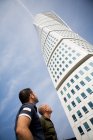 Male friends looking at Turning Torso — Stock Photo