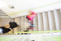 Students moving down steps — Stock Photo